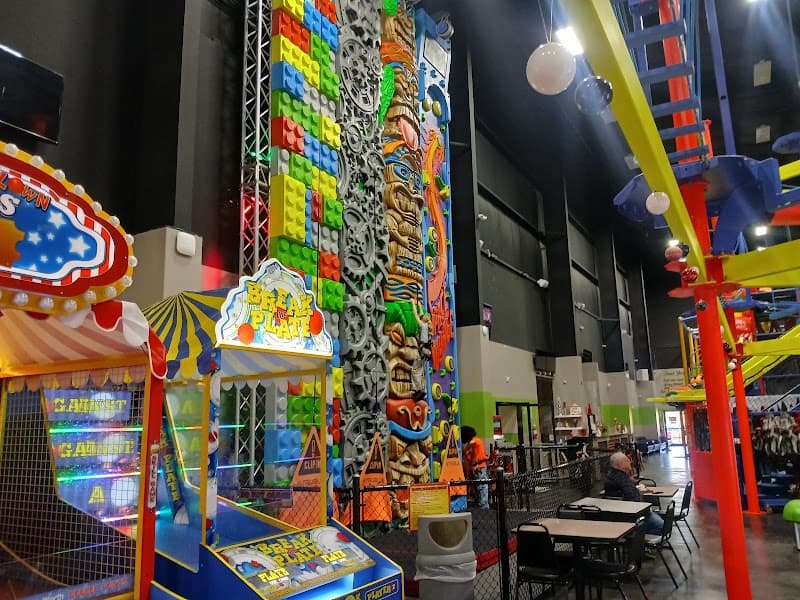 Interior view of Hijinx: The Funtivity Spot | Bowling, Laser Tag, Arcade Games, Ropes Course, Playground | JT's Grill Restaurant bowling alley